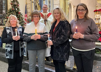 Father Bill Holoubek; Goldie Krivanek, secretary; Sue Vidlak, treasurer; Denise Augustyn, vice president; and Lynn Hall, president