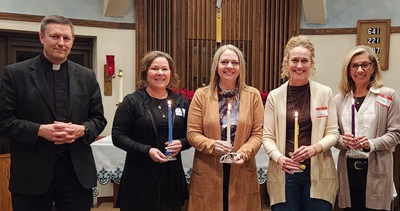 Fr. Craig Doty, Kelly Brakenhoff, vice president, Linda Aschoff, secretary, Kelly Chapman, treasurer, and Linda Rienks, president