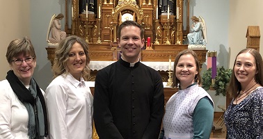 Barb Jensen, treasurer; Michelle Baxa, vice pres; Fr. Kaup, Pastor; Liz Bruggeman, pres; Kay Stander, secretary