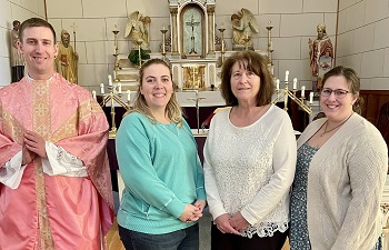 Fr. Kain, Miranda Fontenot, Pat Fujan and Melissa O'Reilly