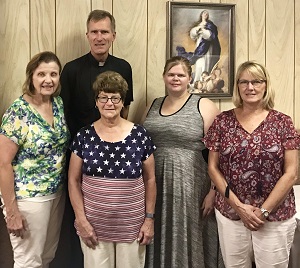 Donna Krumbach president, Karen Gabel treasurer, Father Leo Seiker, Joelle Wacker vice pres., Diane Ward secretary