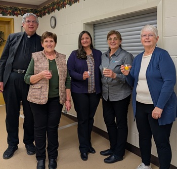 Father Micheal Stec, President Terri Prochaska, Vice President Phyllis Wynegar, Secretary Monica Crawford, Treasurer Mary Prigge.
