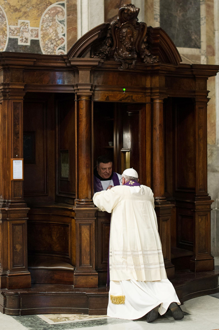 Confession - A priest hears a confession from Pope Francis during a penance service in St. Peter’s Basilica at the Vatican March 28. (CNS photo/L’Osservatore Romano via Reuters)