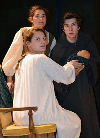 Maureen Winter, Rose Seeman (seated), and Robert Kirkpatrick appear in the STAGE’s “The Outlaws of Ravenhurst.” The musical tells the story of persecuted Catholics during the reign of Henry VIII and beyond, and depicts the struggle for religious freedom.
